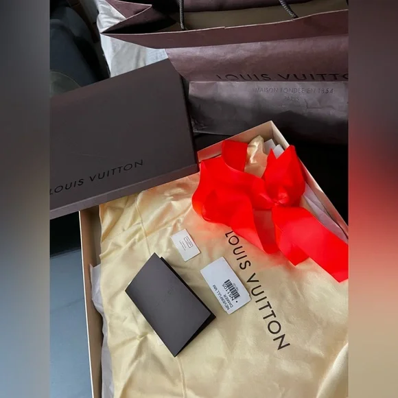 Louis Vuitton Dark Brown Box with Vibrant Red Ribbon